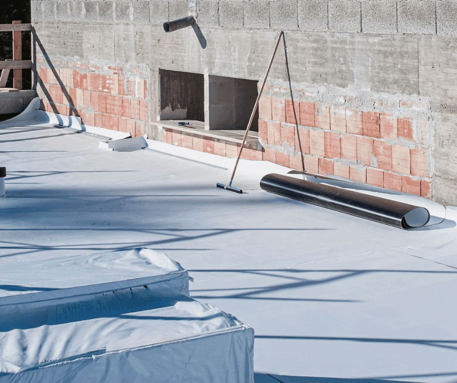 Commercial flat roof being worked on
