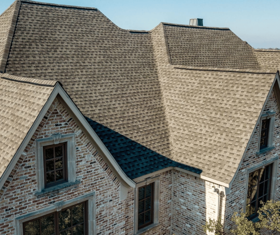 Gray shingles on a residential roof needing repair