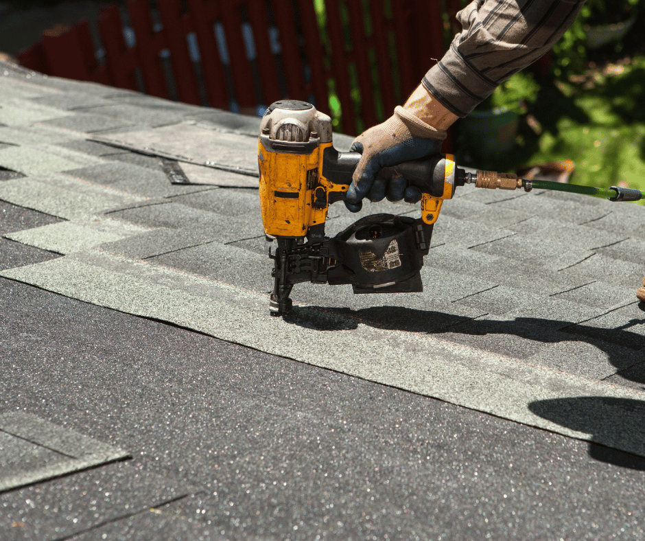 Gray shingles on a residential roof needing repair